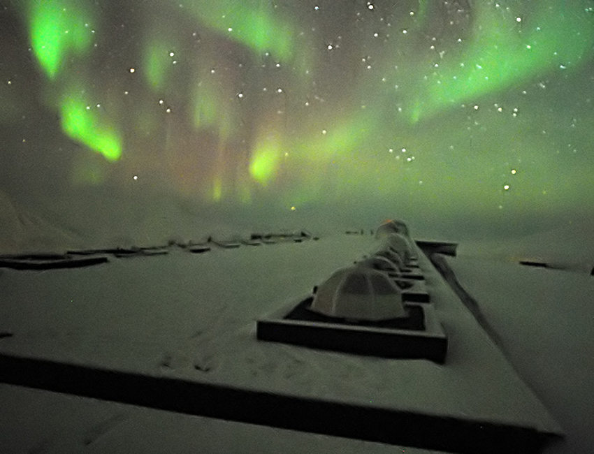 Northern lights over Kjell Henriksen Observatory