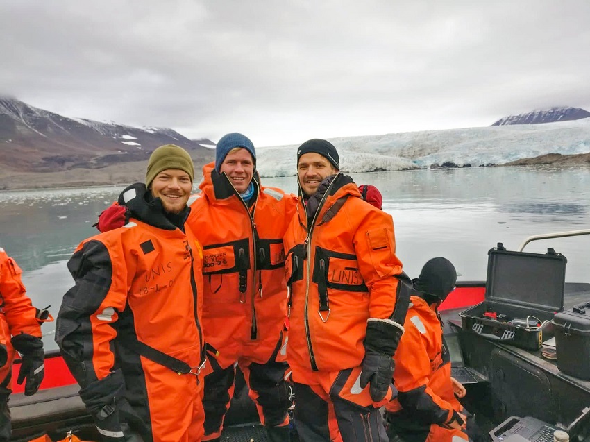 Three students in front of the Nordenskiöld glacier.